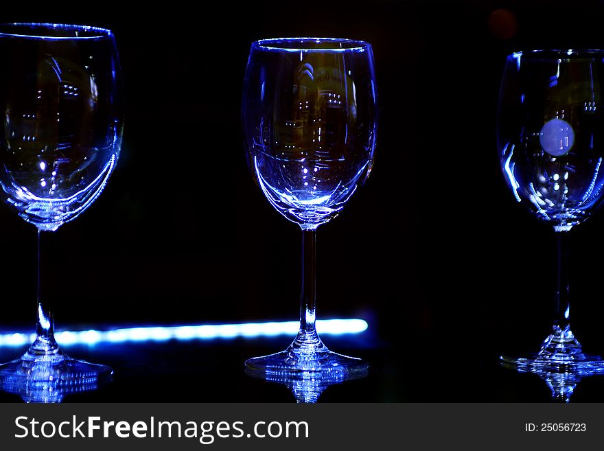 Empty sparkling glasses in bar