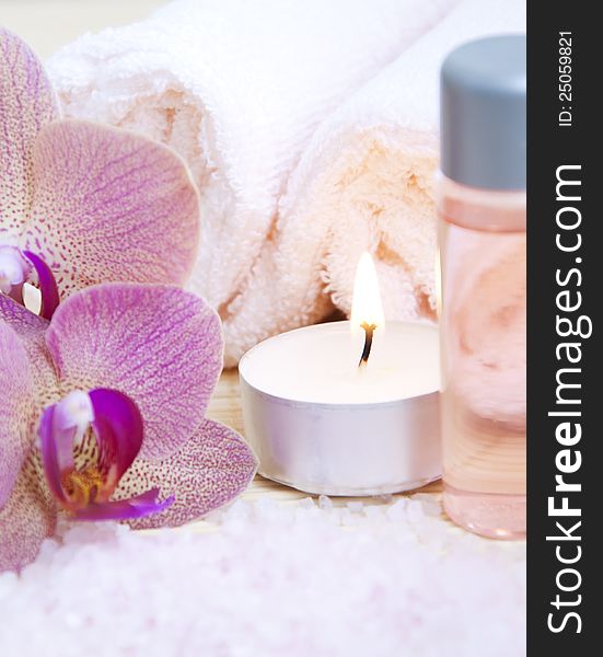 Spa theme with orchids, towesl and burn candles. Spa theme with orchids, towesl and burn candles