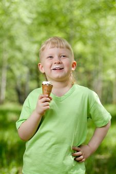 Young Boy Eating A Tasty Ice Cream Outdoor Stock Photo Young Boy Eating A Tasty Ice Cream Outdoor Stock Photo