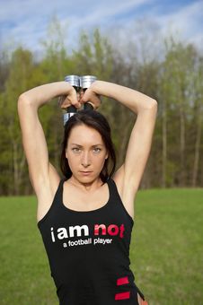 Woman Working With Dumbbell Royalty Free Stock Photo