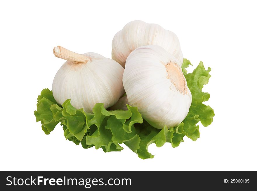 Garlic decorated parsley leaves on white background. Garlic decorated parsley leaves on white background