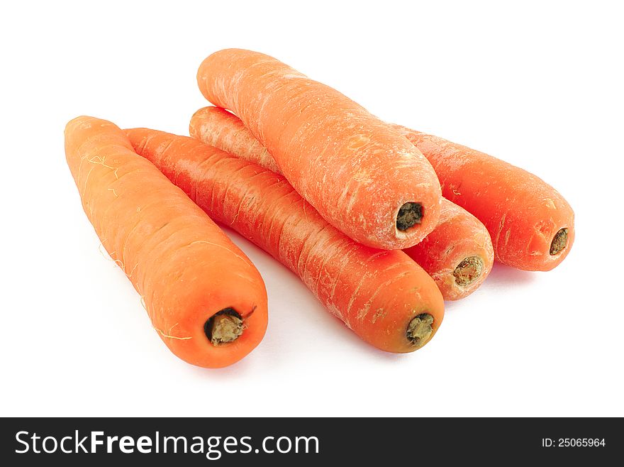 Five fresh carrots on white background