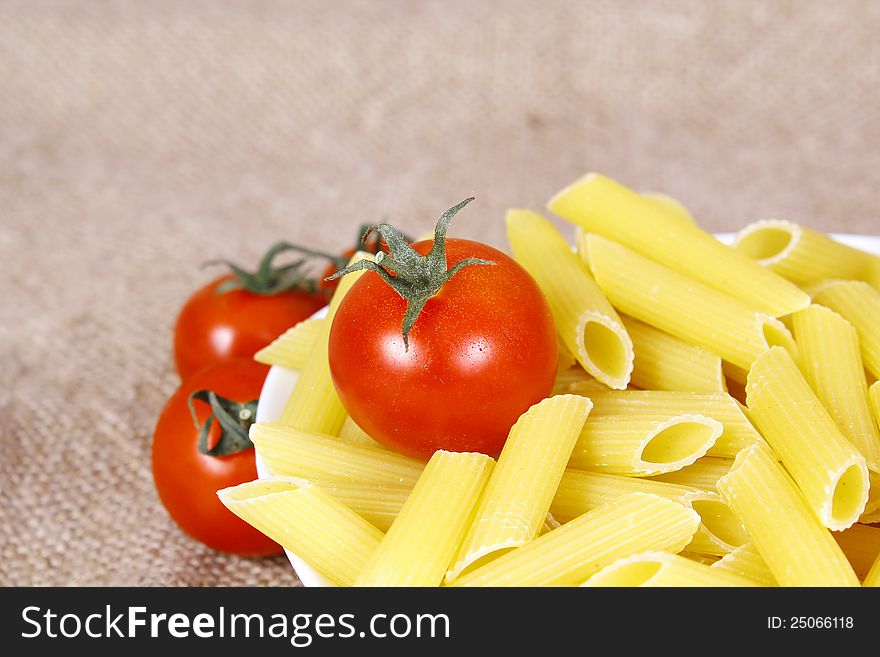 Italian pasta with tomato on a plate
