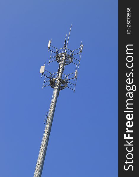 Telecommunications tower. Mobile phone base station in Blue Sky