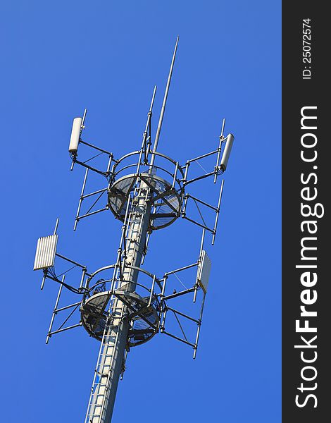 Telecommunications tower. Mobile phone base station in Blue Sky
