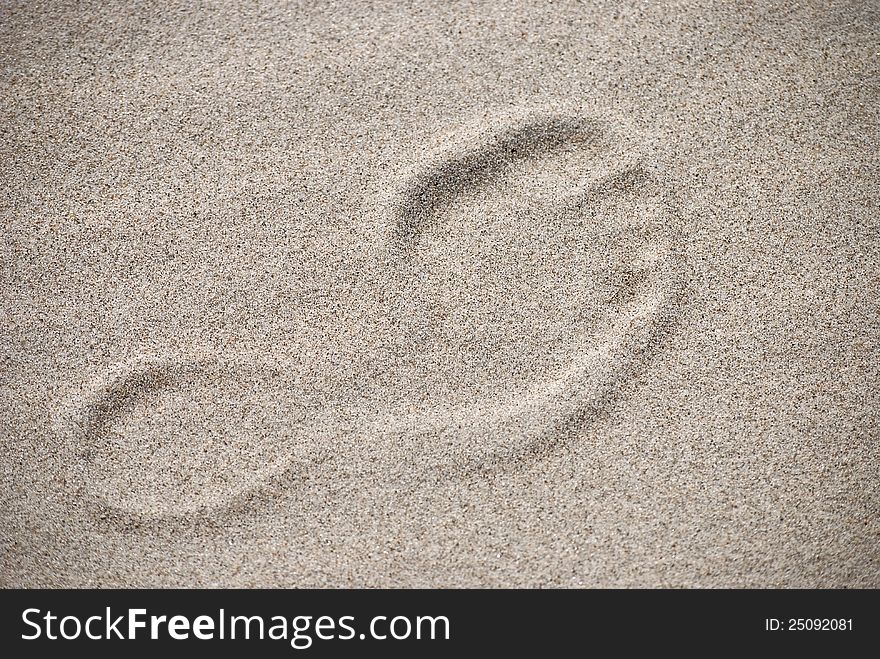 Footprint in the sand, from tropical beach