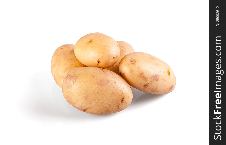 Raw potatos isolated on white