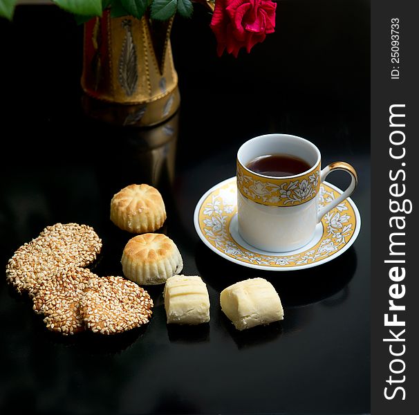 Oriental cookies and cup of tea