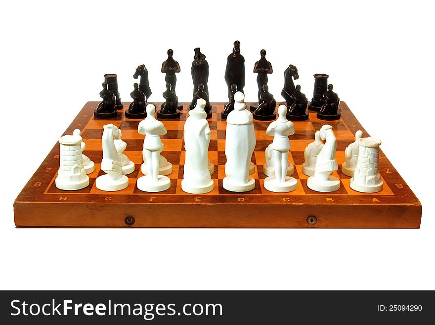 Vintage chessboard with black and white original figures, isolated on a white background. Vintage chessboard with black and white original figures, isolated on a white background.