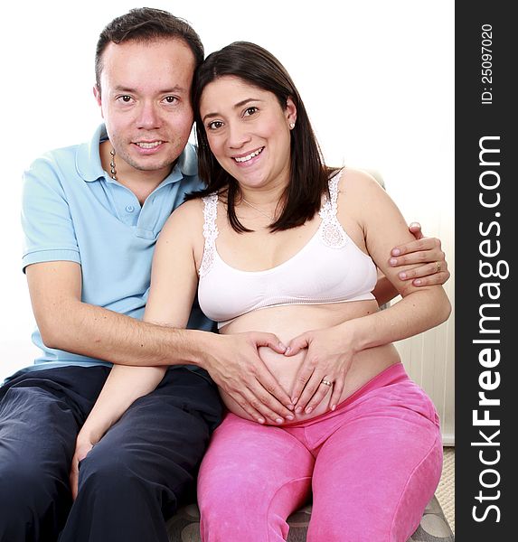 Portrait of a happy young pregnant women with her husband. Portrait of a happy young pregnant women with her husband