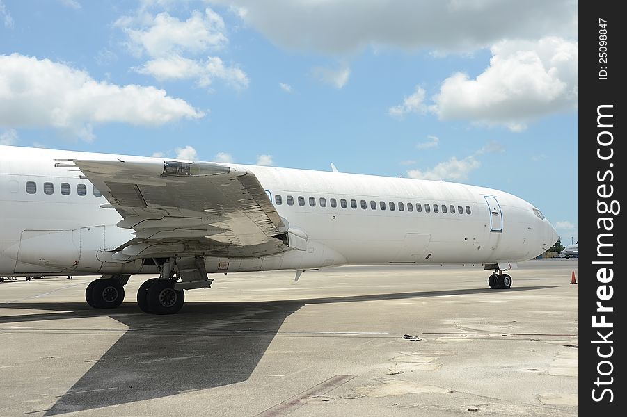 Jet airplane fuselage and nose view on the ground. Jet airplane fuselage and nose view on the ground