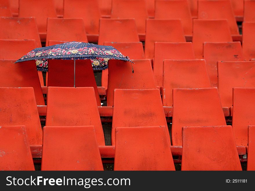 A little umbrella alone in the tribune