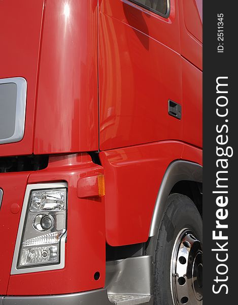 Brand new red truck cabin, frontal external view. Brand new red truck cabin, frontal external view.