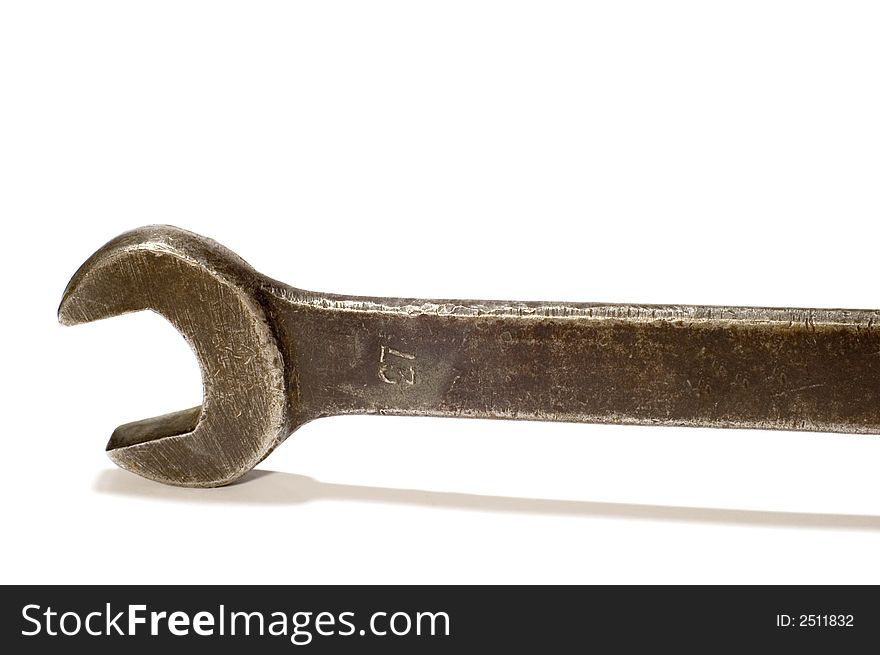 Series object on white tool Old wrench