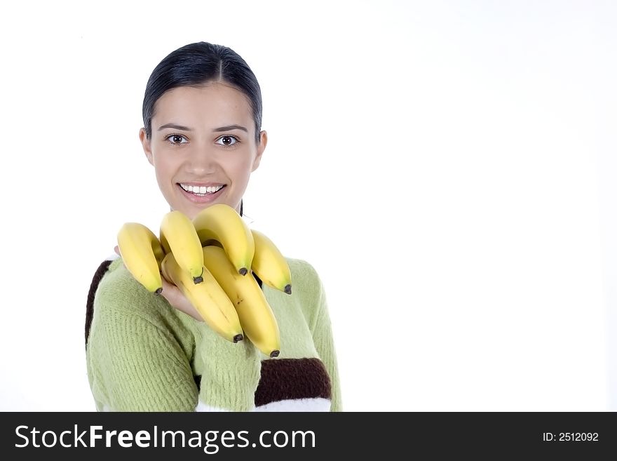 Smiling girl holding bananas in her hands. Smiling girl holding bananas in her hands