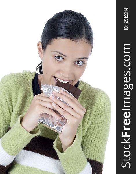 Smiling girl with chocolate in her hands