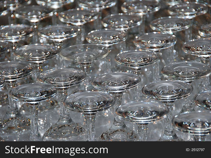 Upturned drinking glasses creating an abstract pattern. Upturned drinking glasses creating an abstract pattern