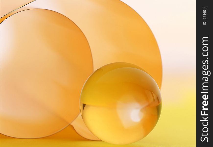 Crystal sphere on an orange background. Crystal sphere on an orange background
