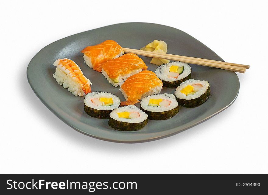 Sushi on grey plate on white background. Sushi on grey plate on white background.