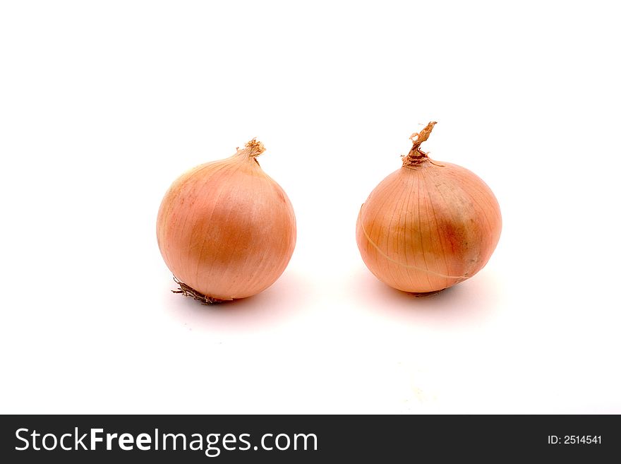 Two onions, isolated on white

<a href=http://www.dreamstime.com/search.php?srh_field=food&s_ph=y&s_il=y&s_sm=all&s_cf=1&s_st=wpo&s_catid=&s_cliid=301111&s_colid=&memorize_search=0&s_exc=&s_sp=&s_sl1=y&s_sl2=y&s_sl3=y&s_sl4=y&s_sl5=y&s_rsf=0&s_rst=7&s_clc=y&s_clm=y&s_orp=y&s_ors=y&s_orl=y&s_orw=y&x=29&y=15> See more food pictures.</a>