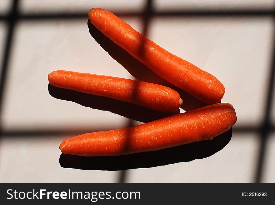 Red carrots on the floor