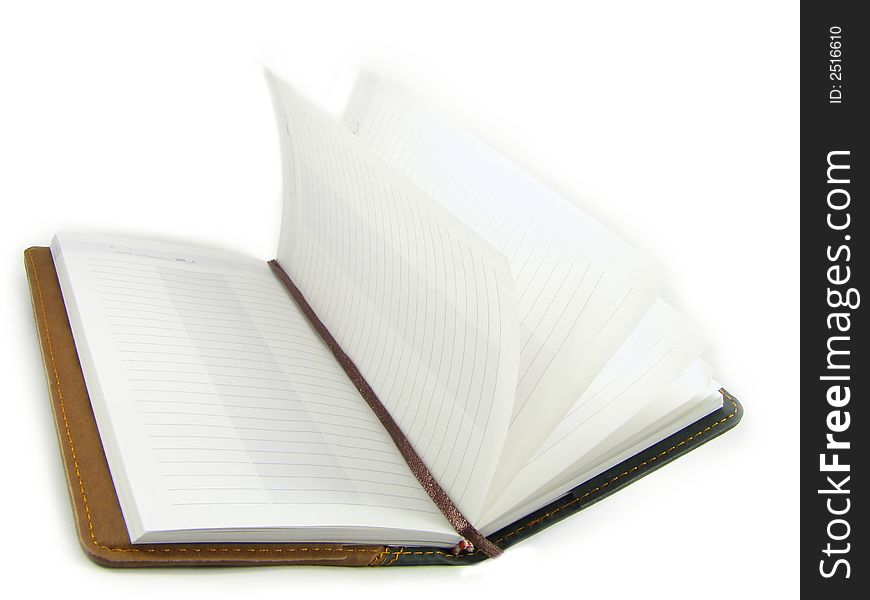 The open notebook isolated, on a white background. The open notebook isolated, on a white background.
