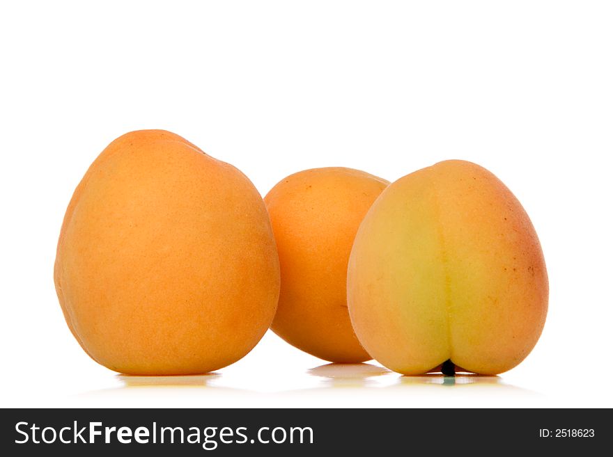 Apricots isolated over white background