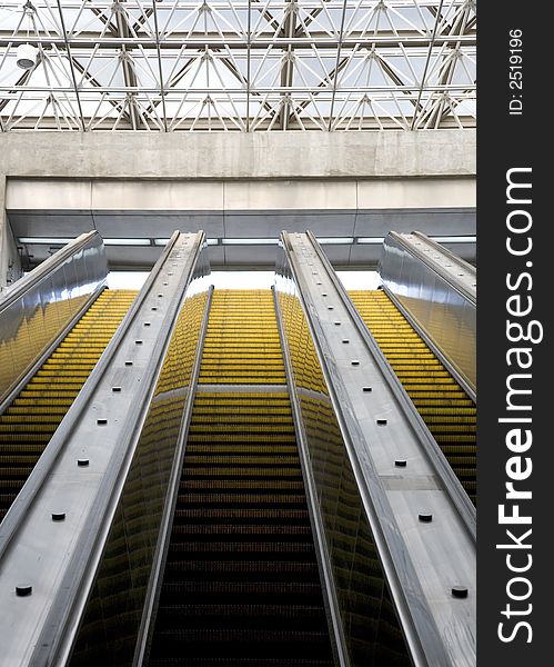 Yellow escalator ascending out of the Atlanta, Georgia Marta