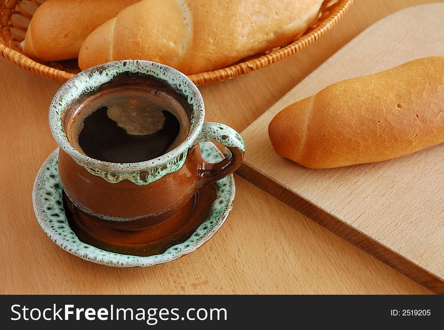 Morning cup of coffee on the table.