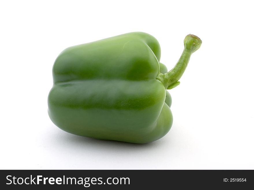 A green bell pepper, lying flat, isolated on white

<a href=http://www.dreamstime.com/search.php?srh_field=food&s_ph=y&s_il=y&s_sm=all&s_cf=1&s_st=wpo&s_catid=&s_cliid=301111&s_colid=&memorize_search=0&s_exc=&s_sp=&s_sl1=y&s_sl2=y&s_sl3=y&s_sl4=y&s_sl5=y&s_rsf=0&s_rst=7&s_clc=y&s_clm=y&s_orp=y&s_ors=y&s_orl=y&s_orw=y&x=29&y=15> See more food pictures.</a>
. A green bell pepper, lying flat, isolated on white

<a href=http://www.dreamstime.com/search.php?srh_field=food&s_ph=y&s_il=y&s_sm=all&s_cf=1&s_st=wpo&s_catid=&s_cliid=301111&s_colid=&memorize_search=0&s_exc=&s_sp=&s_sl1=y&s_sl2=y&s_sl3=y&s_sl4=y&s_sl5=y&s_rsf=0&s_rst=7&s_clc=y&s_clm=y&s_orp=y&s_ors=y&s_orl=y&s_orw=y&x=29&y=15> See more food pictures.</a>