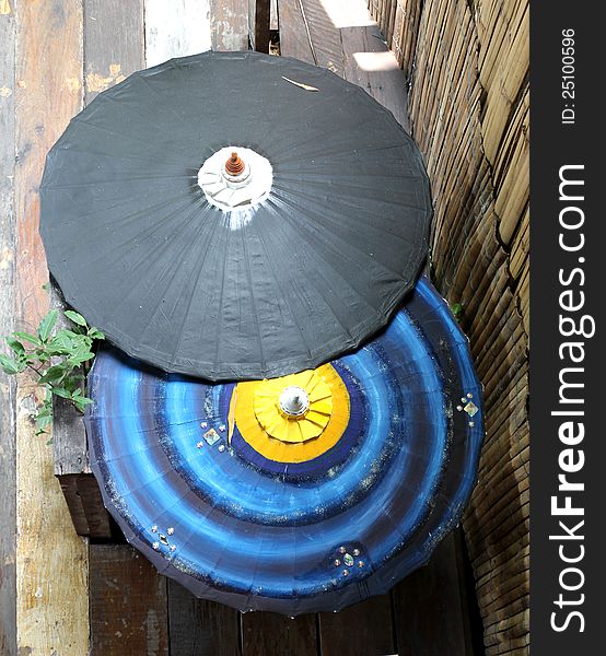 Image of top view Thai traditional umbrella is made of bamboo and paper in Thai house