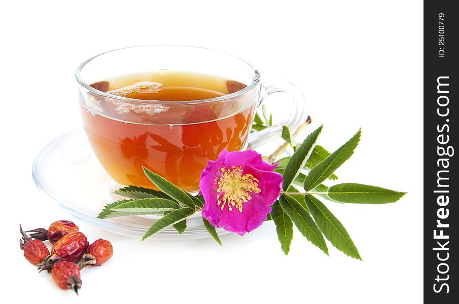 Cup of rose hip tea on a white background