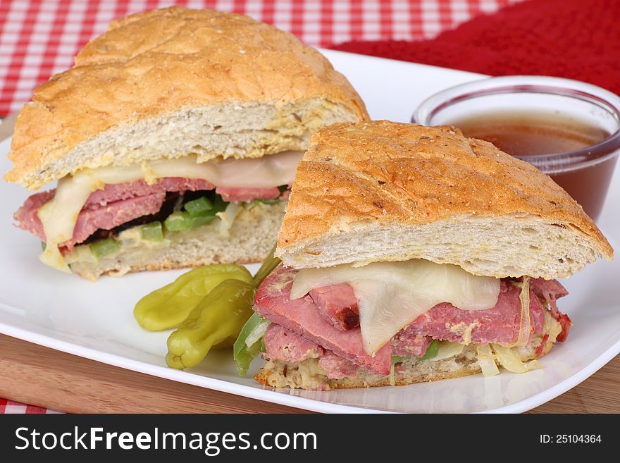 Roast beef and cheese sandwich on a plate