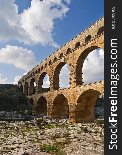 Ancient Roman aqueduct bridge that crosses the Gard River in southern France. Ancient Roman aqueduct bridge that crosses the Gard River in southern France