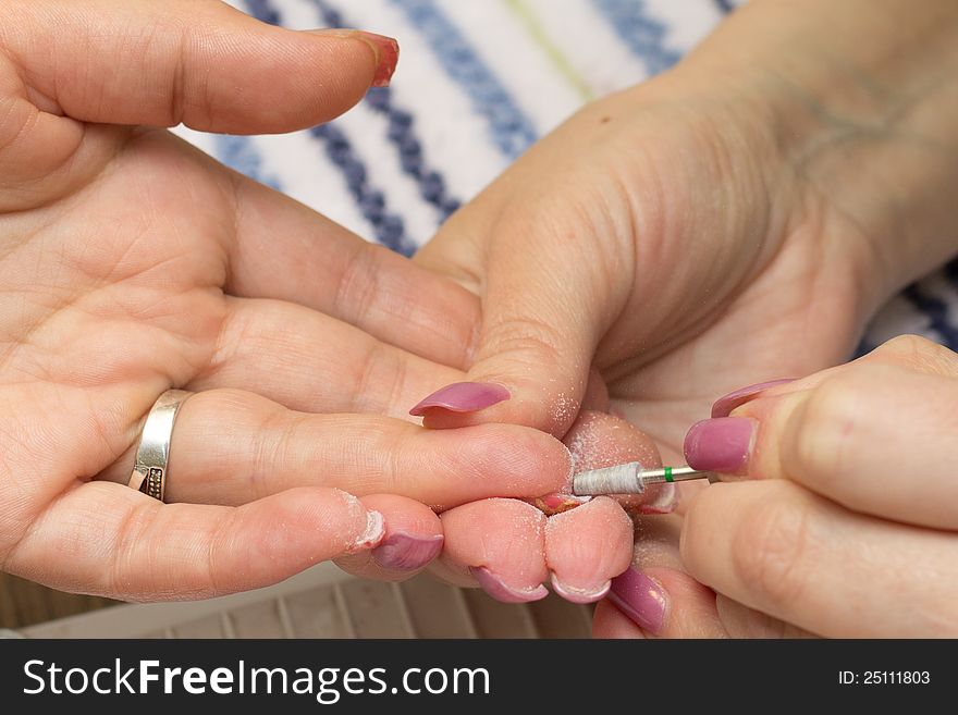 Professional treatment of nail during manicure