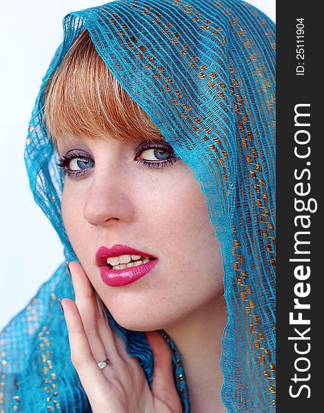 Enticing - blue eyes and a blue veil. Enticing - blue eyes and a blue veil