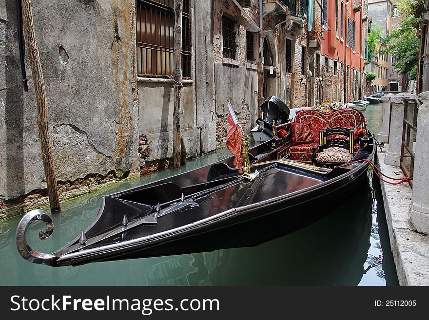 A Gondola In The Waterways Of Venice