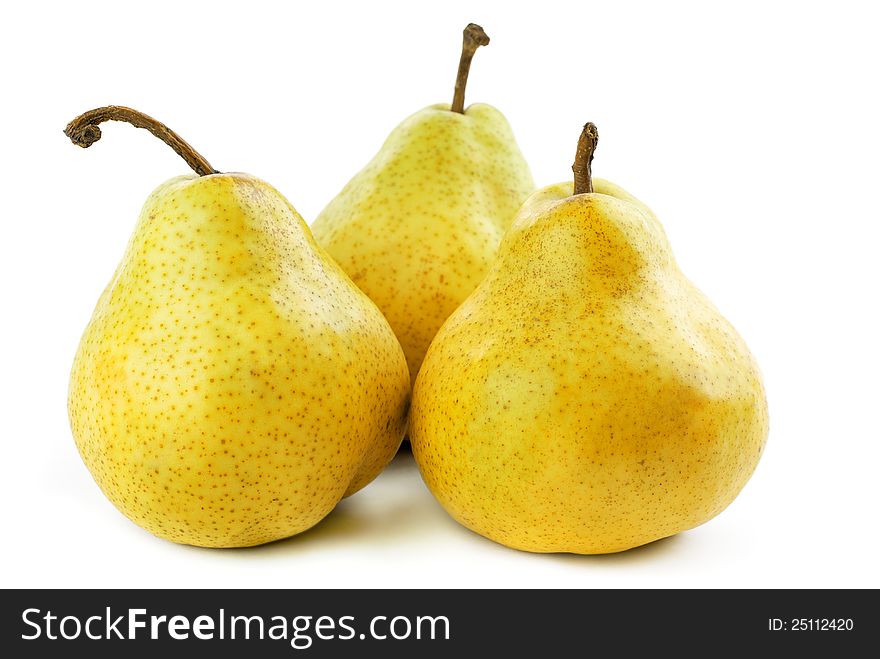 Three  ripe  and juicy pears on a white background. Three  ripe  and juicy pears on a white background