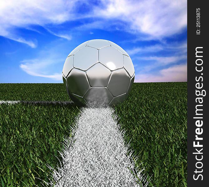 Silver soccer ball in the grass isolated on against the sky