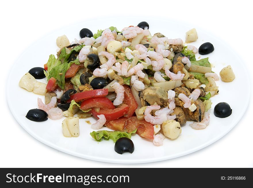 Salad with shrimp and vegetables on a white background