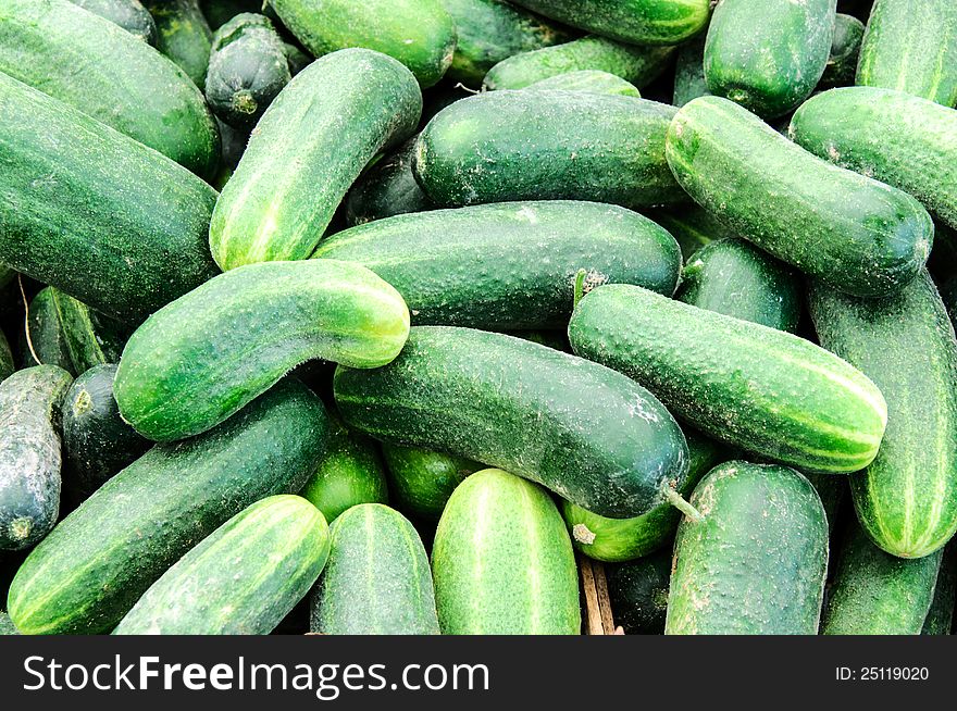 Cucumbers background on the green market