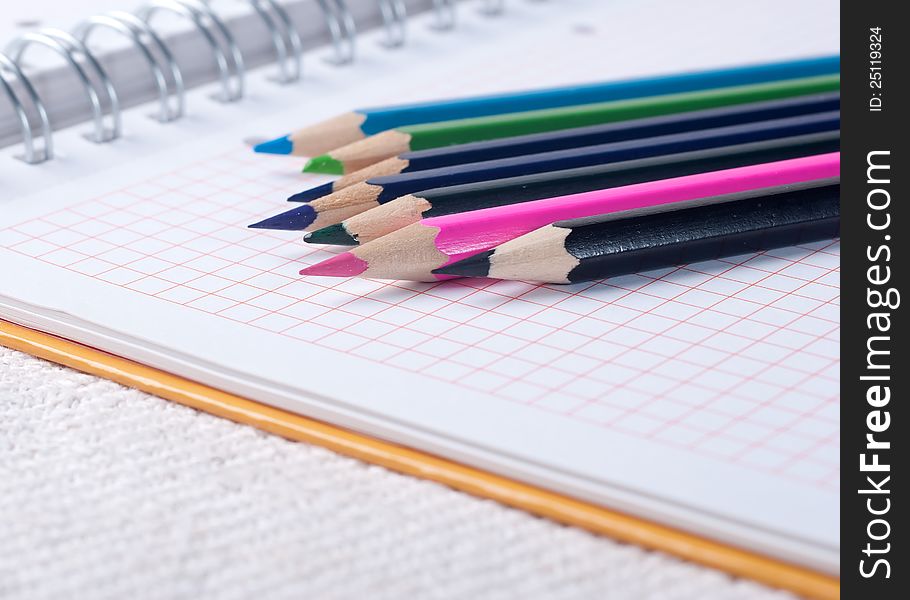 Paper And Pencils On The Table