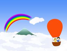 Hot Air Ballon Going Over The Rainbow Royalty Free Stock Photography