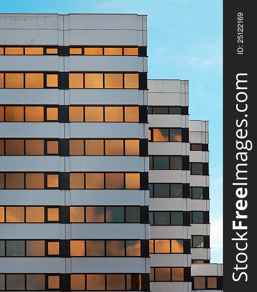 Modern business buildings in Hamburg (St.Georg) with reflections of the clouds on the windows. Modern business buildings in Hamburg (St.Georg) with reflections of the clouds on the windows.