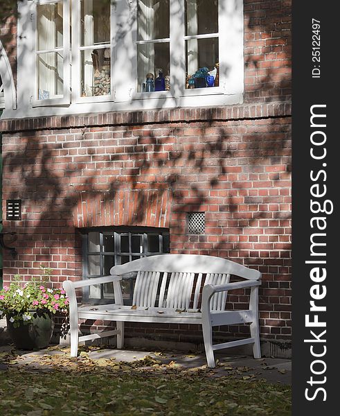 The wooden bench in a garden of a monastery in Hamburg.