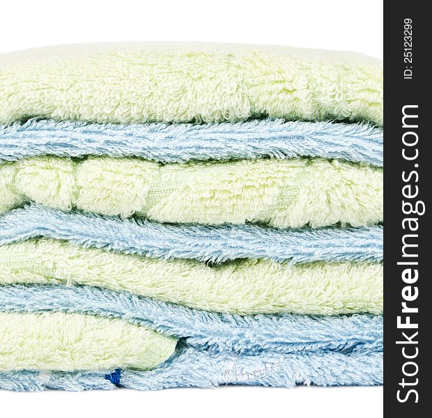 Green and blue towel lie on each other. Green and blue towel lie on each other