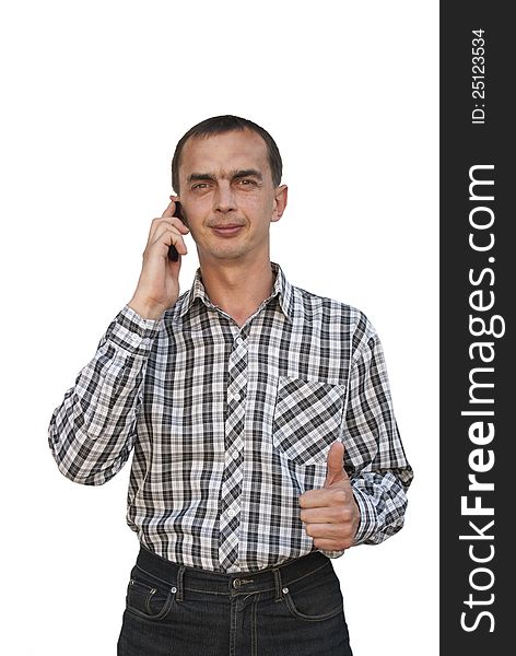 Young man talking on the phone on a white background. Young man talking on the phone on a white background