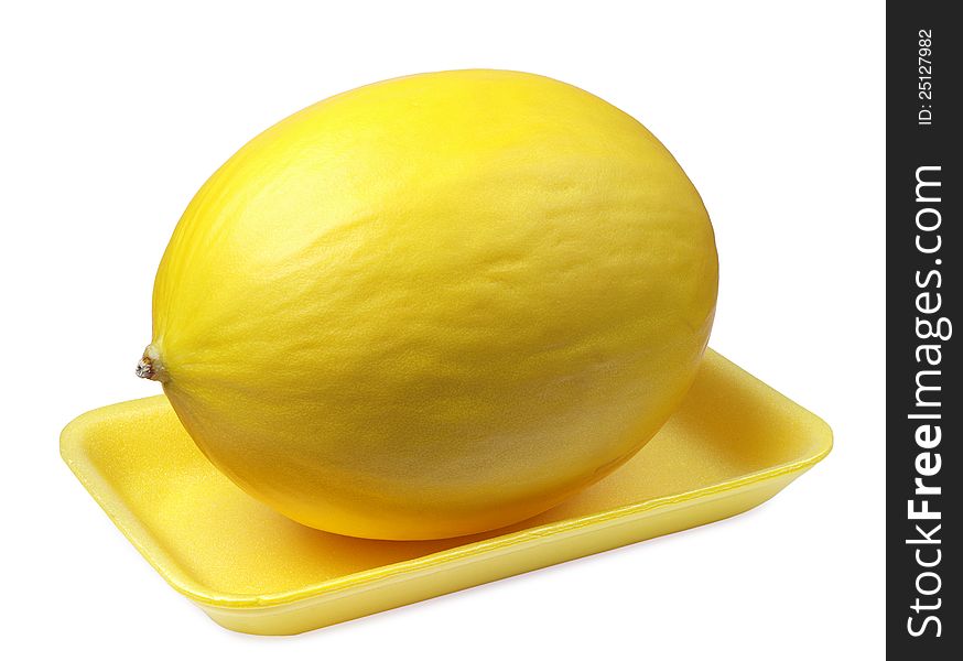 Sweet melon on a yellow plastic food tray on white. Sweet melon on a yellow plastic food tray on white