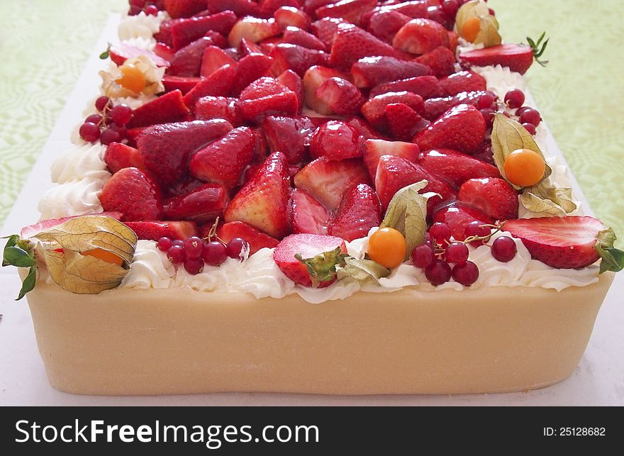 Large marzipan cake with fresh fruits toppings. Large marzipan cake with fresh fruits toppings