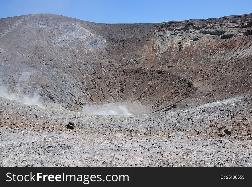 Walking around the ctrater of the volcano. Volcano island. Italy. Walking around the ctrater of the volcano. Volcano island. Italy.